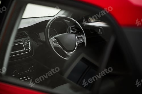 Preview: Interior view of car with black interior through the glass.