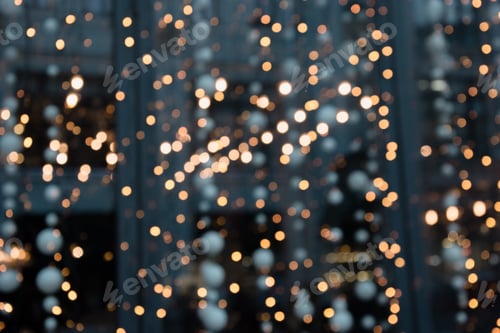 Preview: Astract nightlife background. Blurred golden garland blur bokeh, defocused pattern. City lights.