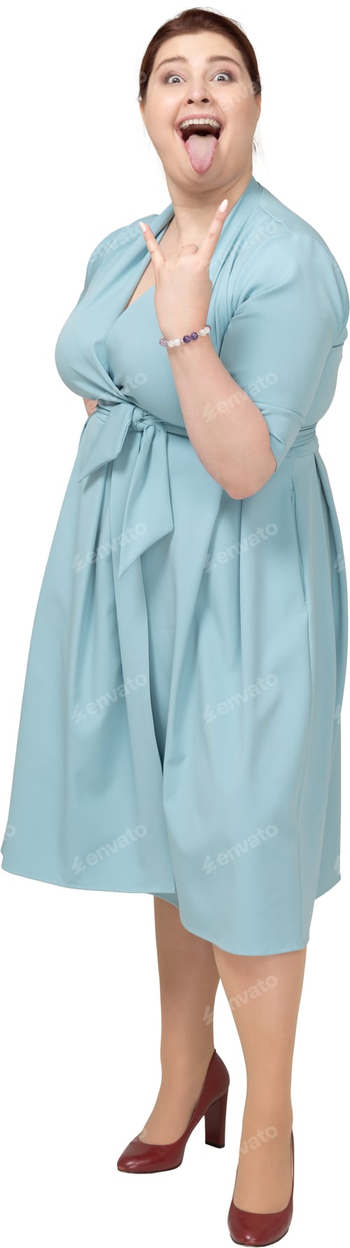 Preview: a woman in a blue dress with her arms crossed