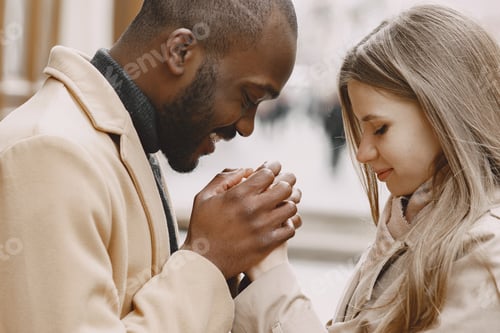 Preview: Mixed couple spenting time together in a spring city