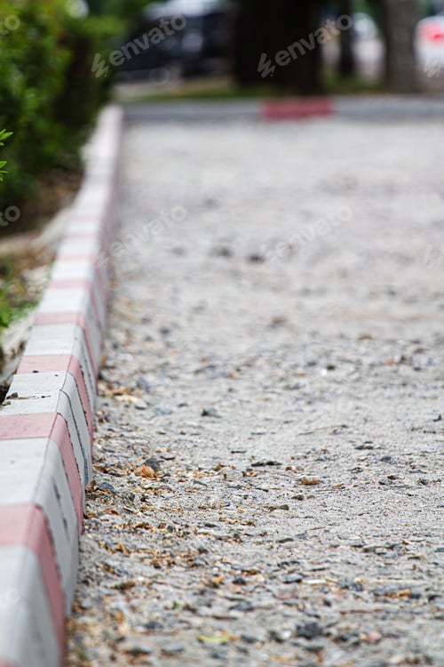 Preview: Installation of a curb made of concrete blocks, road repair in the street in the city