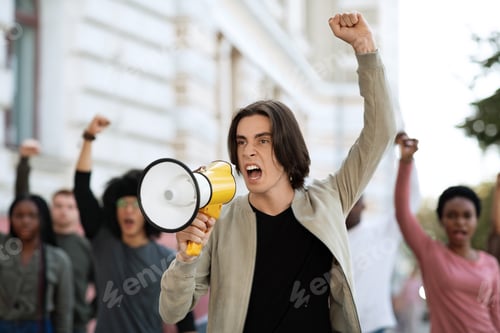 Preview: Leader of strikers with loudspeaker yelling demands