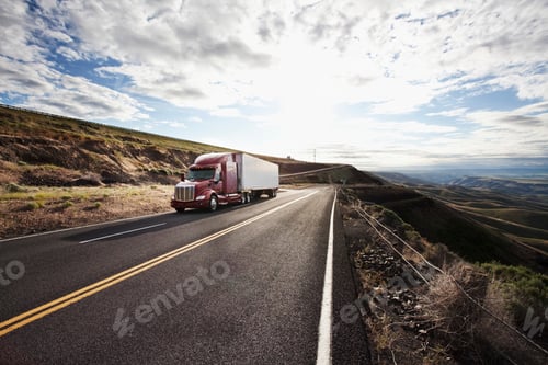 Preview: commercial truck driving through the high desert country of eastern Washington, USA