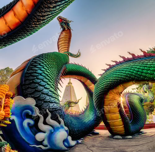 Preview: Rainbow carve serpent or colorful Thai Naga surrounding Sri Maha Pho Chedi stupa in the sunset
