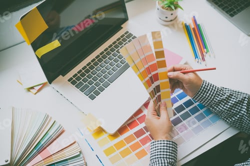 Preview: The graphic designer creative team is currently working on the design and color selection