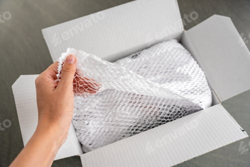 Preview: Corrugated white paper for safe transportation, in which the goods brought by the courier delivery