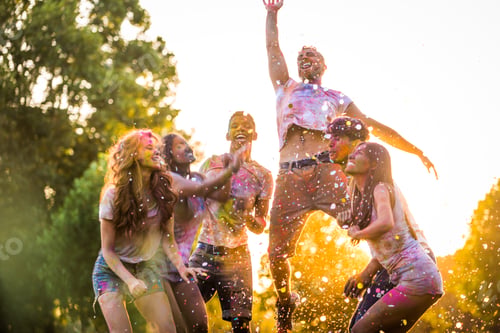 Preview: Friends playing with holi powder