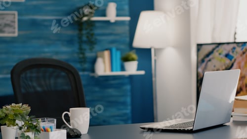 Preview: Empty workplace home office with modern design and laptop placed on desk