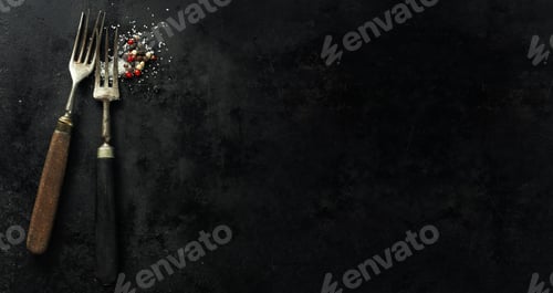 Preview: Vintage old rustic cutlery on dark background