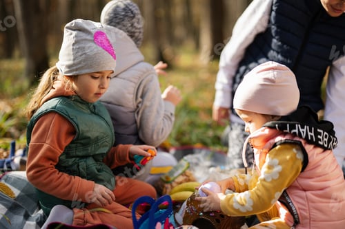 Preview: Kids in family picnic at fall forest. Beautifull autumn day.
