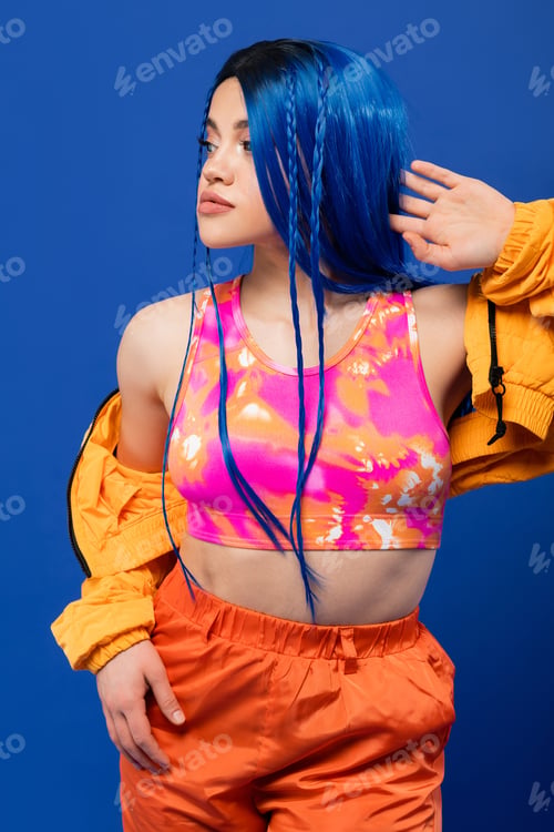 Preview: vibrant clothes, dyed hair, female model with blue hair posing