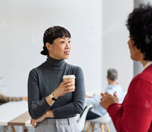 Preview: Group of young business people having a meeting in the office