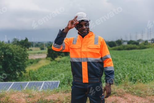 Preview: Engineer Checking solar panels in agriculture farm land.