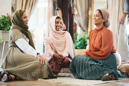 Preview: Ive missed seeing you so much. Shot of a group of muslim women relaxing together.