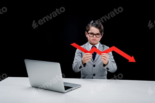 Preview: Boy with laptop and arrow at workplace isolated on black