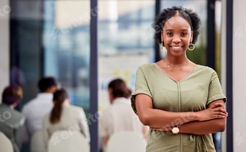 Preview: Shot of a businesswoman smiling at a business meeting in a modern office