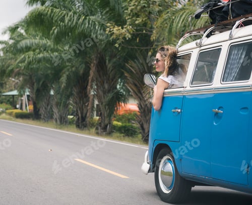 Preview: Woman Sitting in a Car Put Head Out of Window Wind Blowing Her H