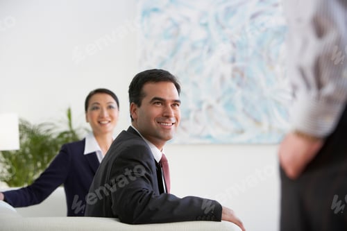 Preview: Business colleagues in a lobby area