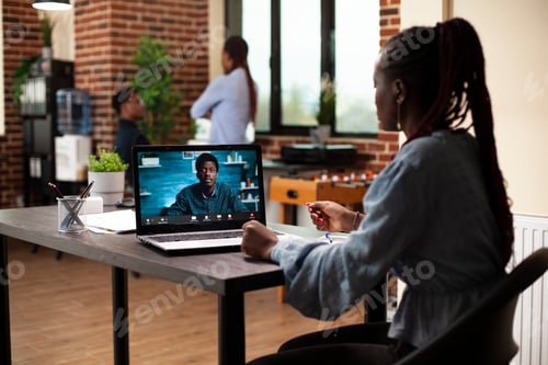 Preview: Woman on videocall with black man