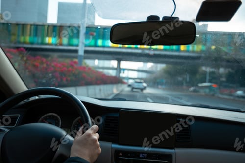Preview: People driving car on city road