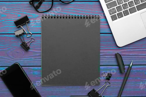 Preview: office desk with blank notepad, laptop and office supplies top view