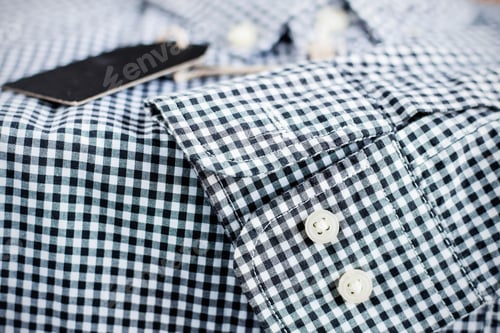 Preview: Close-up of a blue and white gingham shirt