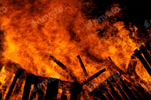 Preview: Big fire on the dark background. Huge bonfire at night
