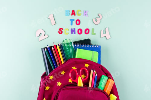 Preview: Backpack with school supplies and books for study. Back to school concept. Flat lay, top view