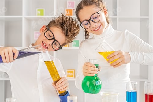 Preview: Enthusiastic mates making experiment with multicolored liquids