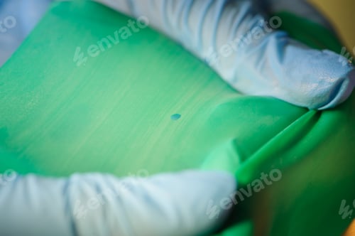 Preview: Dentist's hands with stomatology tool