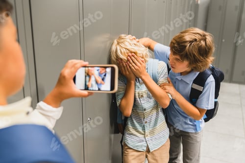 Preview: Schoolchildren cruel boys filming on the phone torturing bullying their classmate in school hall