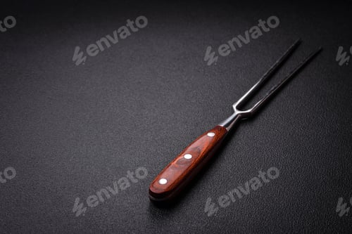 Preview: Kitchen knife and fork made of steel with copy space
