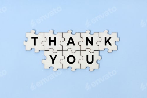 Preview: Thank you phrase on wooden puzzle