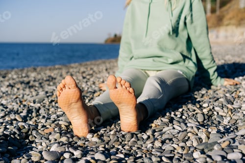 Preview: Close up of female feet after standing on nails.