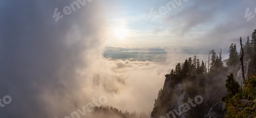 Preview: View of Canadian Mountain Landscape covered in clouds