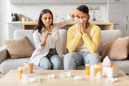 Preview: Unwell man supported by a caring woman