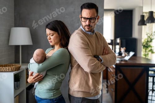 Preview: Frustrated Couple with Baby Standing Back to Back