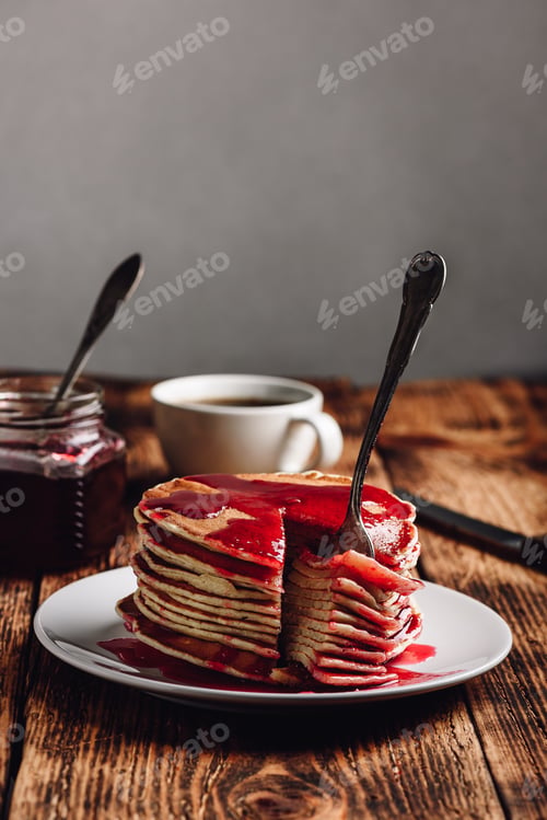 Preview: Stack of pancakes with berry fruit marmalade