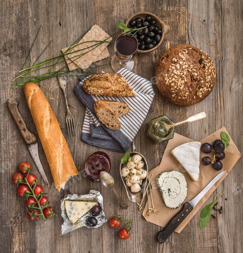 Preview: French snacks on a wooden background
