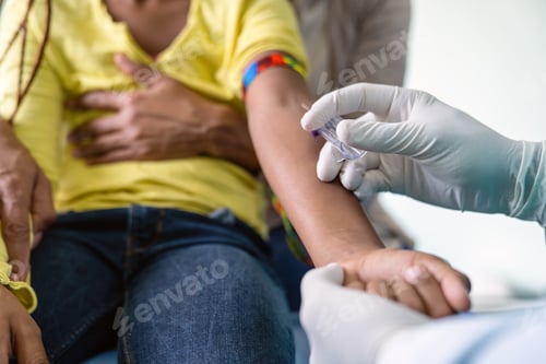 Preview: Pediatrician takes blood from a child patient. Healthcare antibody test coronavirus concept