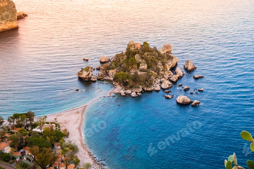 Preview: Isola Bella in Taormina, Sicily, Italy. Aerial view of small beautiful island at sunset