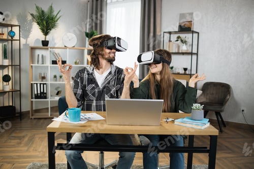 Preview: Young people playing games at home, meditating using VR glasses and laptops.