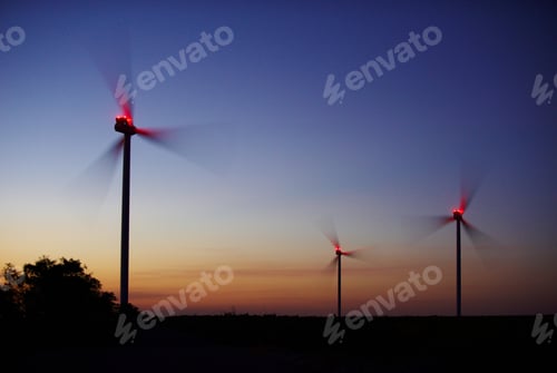 Preview: Wind power generation, Wind turbines on farmland at night