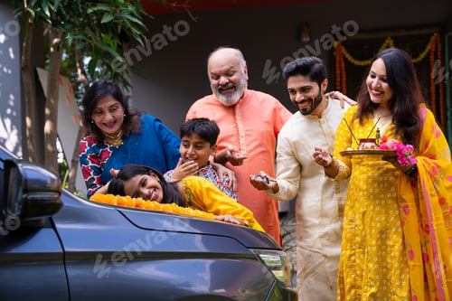 Preview: Indian family performing car puja ceremony to welcome their new vehicle with blessings