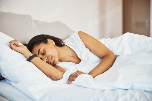 Preview: Beautiful Afro American woman sleeping at home