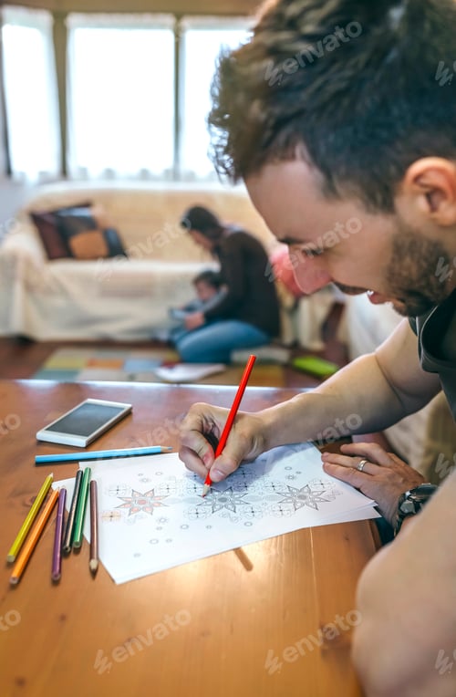 Preview: Young man coloring mandalas