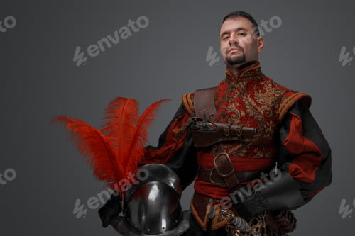 Preview: Stylish musketeer duelist holding helmet against grey background