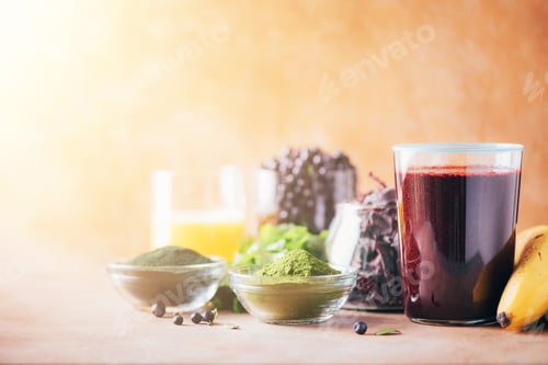 Preview: Healthy eating, alkaline diet, vegan concept. Blueberries, bilberry, barley grass, spirulina powder