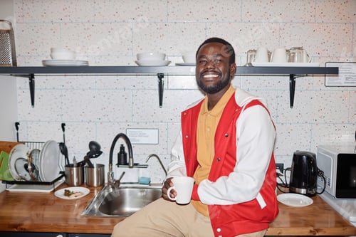 Preview: African American Student Smiling in Kitchen