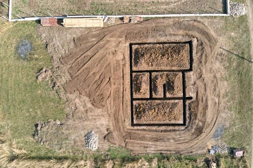 Preview: Dug out trench for building works of new house concrete foundation on construction site